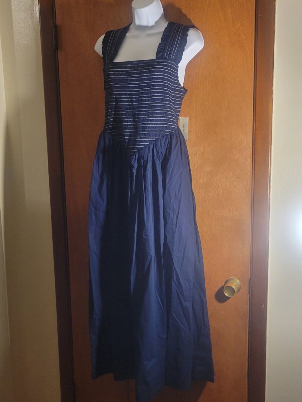Navy Maxi Dress with white stitching.